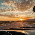 Car driving on scenic road trip