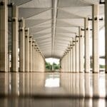 person walking on hallway during daytime